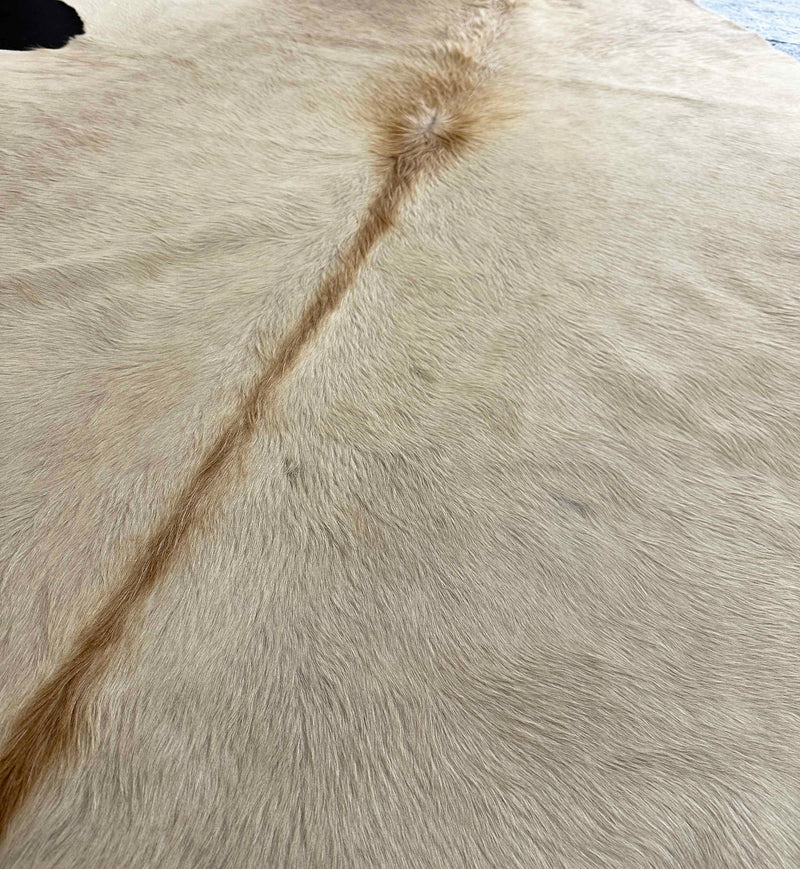 brown cowhide rug