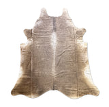 brown cowhide rug