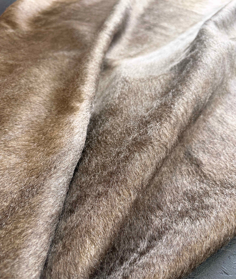 brown cowhide rug