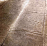 brown cowhide rug