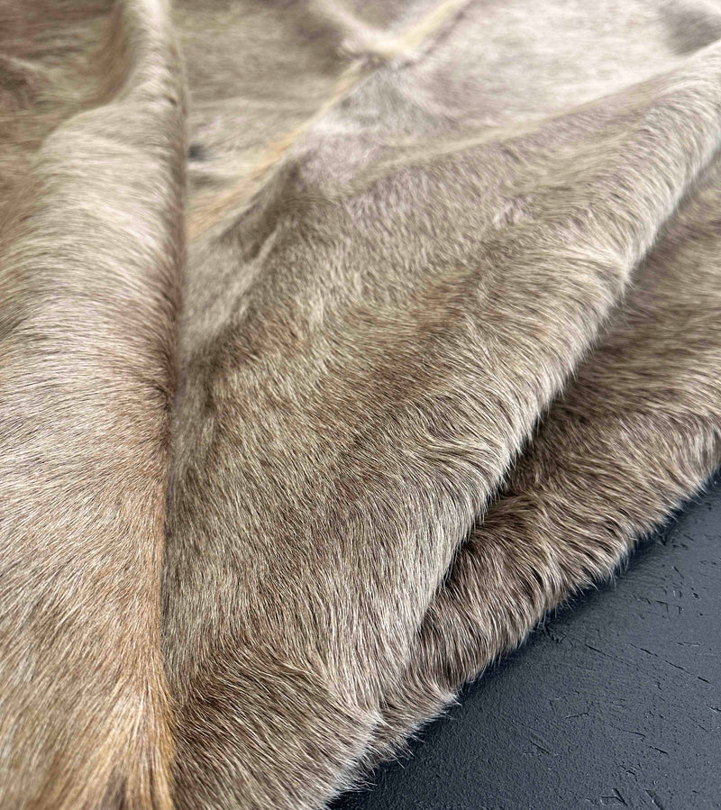 brown cowhide rug