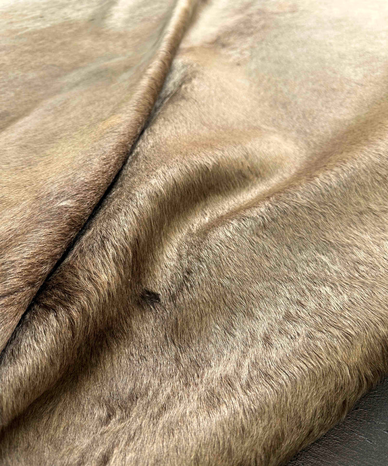 champagne cowhide rug