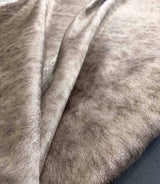 champagne cowhide rug