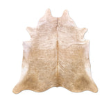 beige cowhide rug