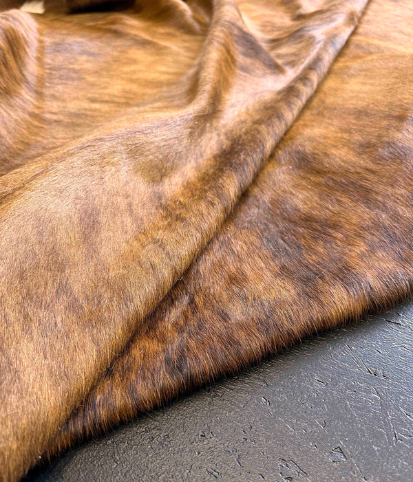 brown cowhide rug