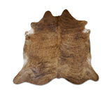 brown cowhide rug