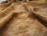 brown cowhide rug