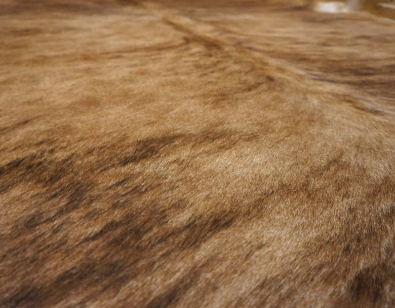 brown cowhide rug