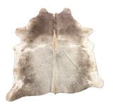 brown cowhide rug