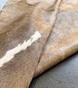 champagne cowhide rug