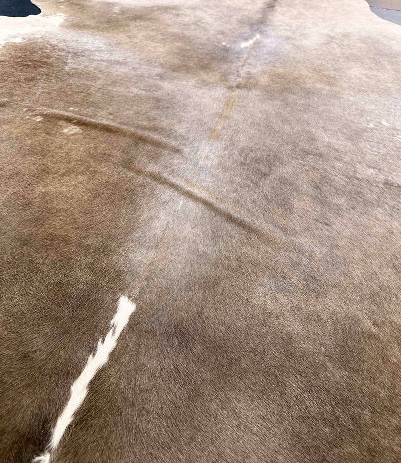 champagne cowhide rug