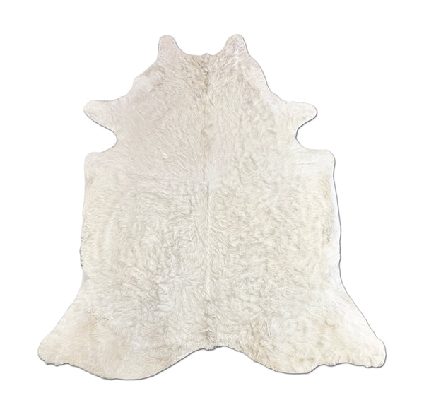 white cowhide rug