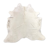 white cowhide rug