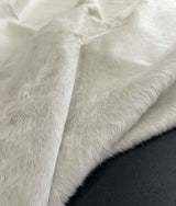 white cowhide rug