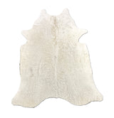 white cowhide rug