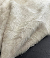 white cowhide rug