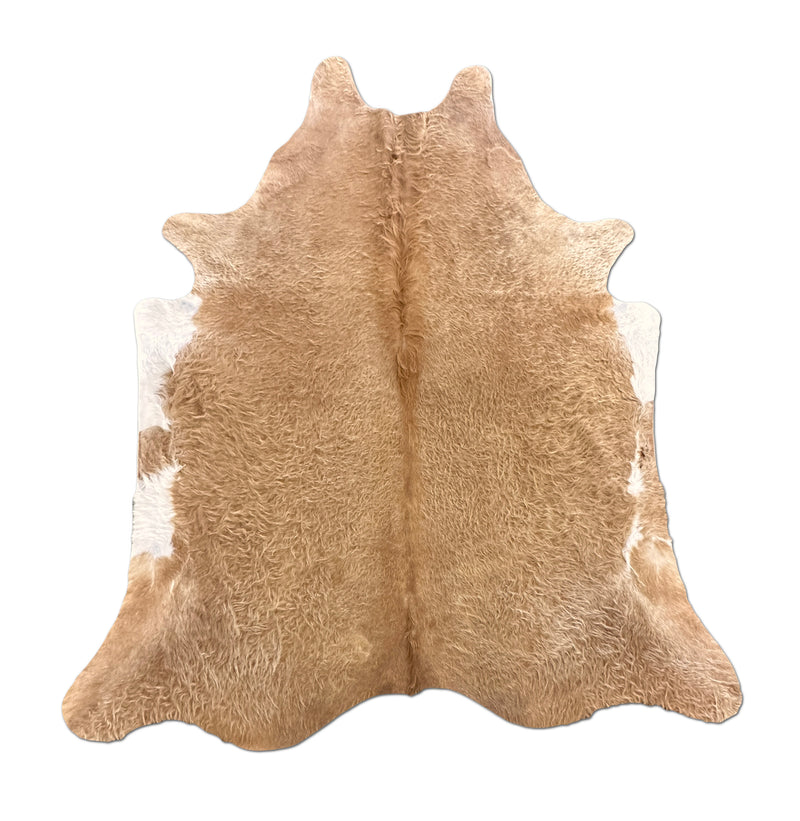 brown cowhide rug