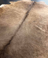 brown cowhide rug