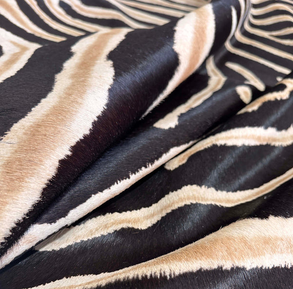 stenciled zebra cowhide rug